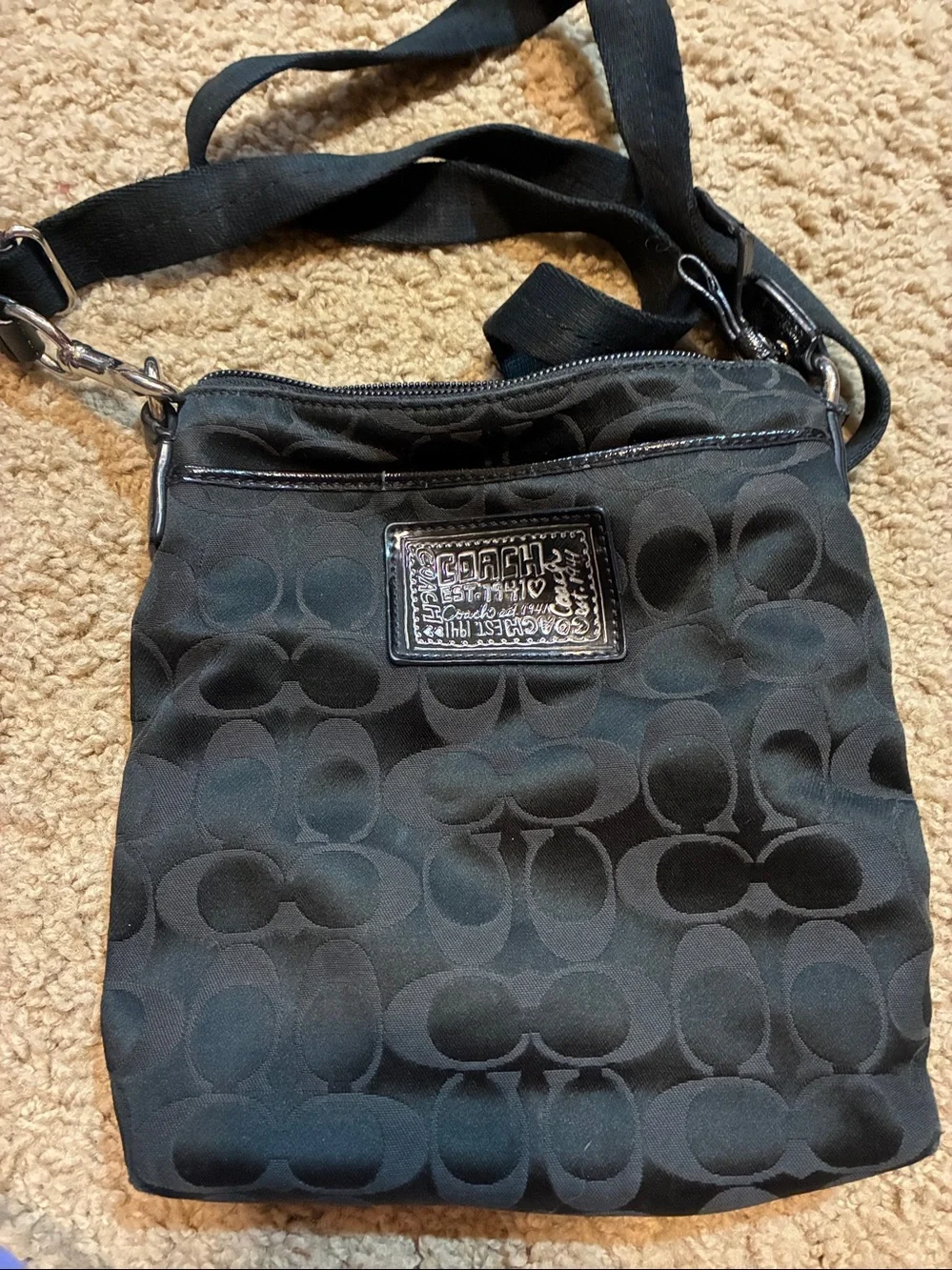 Coach Black Signature Crossbody Purse.Signature logo all over the bag.